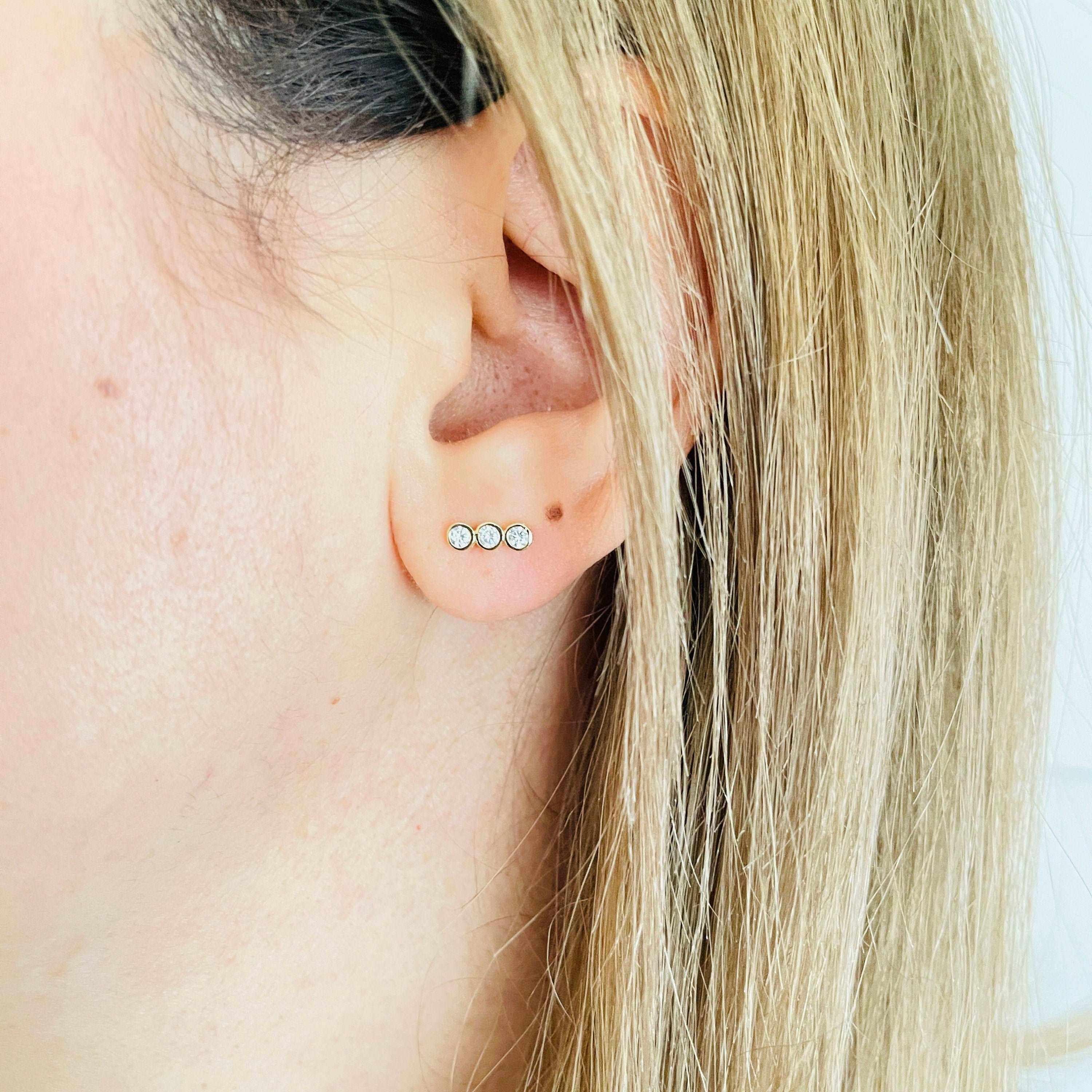 Tiny gold stud clearance earrings